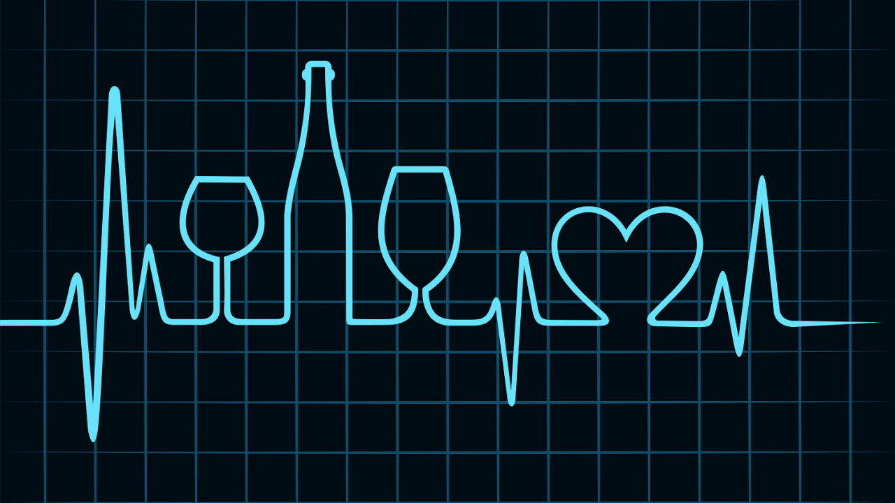 Heartbeat, wine glasses and bottle